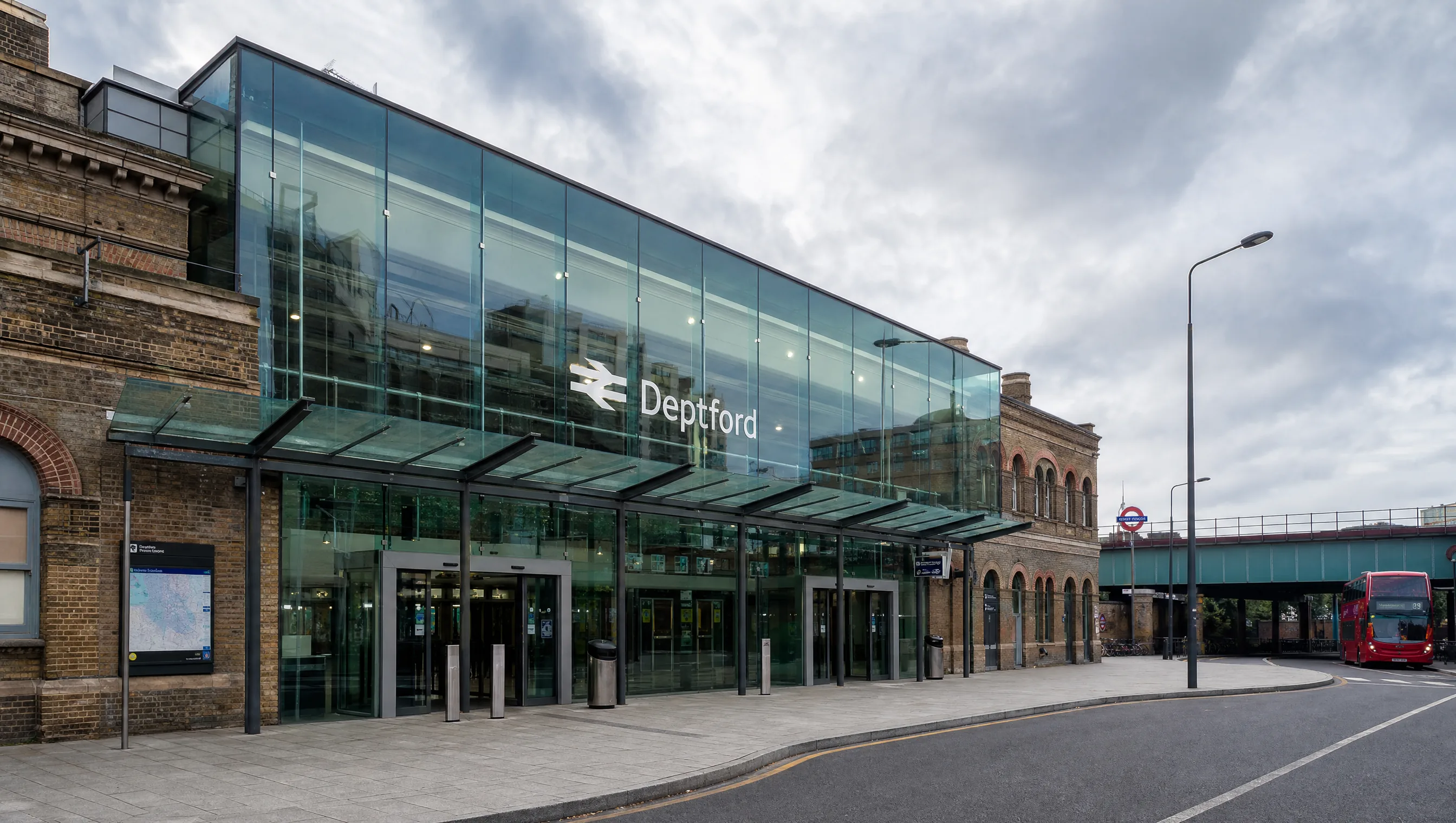 Deptford Station London glass facade and frameless entrance canopy glazed in ClimaGuard Premium2 laminated glass